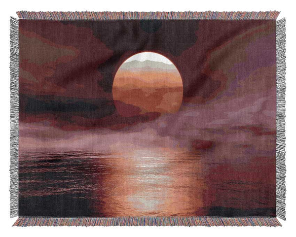The Huge Red Sun Over The Grey Ocean Woven Blanket