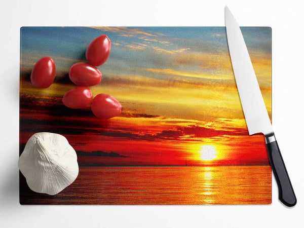 Distant Ocean Sailboat Sunset Glass Chopping Board
