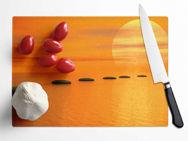 Pebbles To The Tranquil Sun Glass Chopping Board