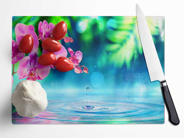 Pink orchid droplet Glass Chopping Board