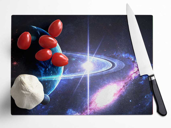 Planet rings in space Glass Chopping Board