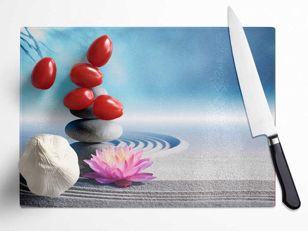 pebbles on zen beach lilly Glass Chopping Board