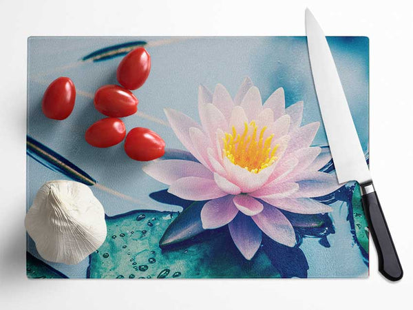 Lotus on the lake close up Glass Chopping Board