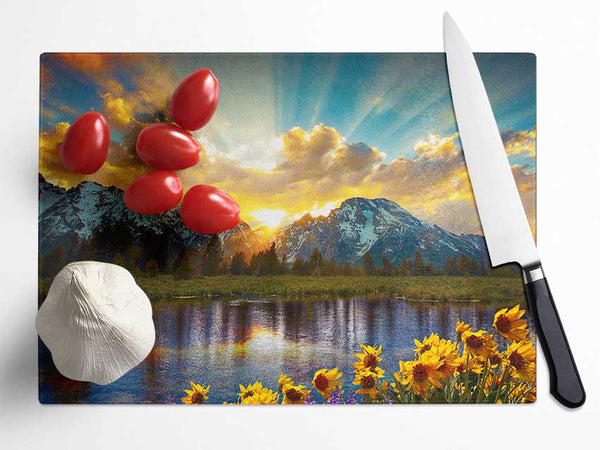 Flowers in front of the mountains Glass Chopping Board