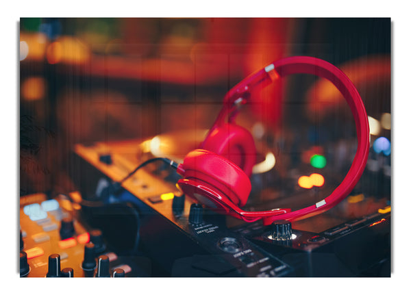Red headphones on mixing desk