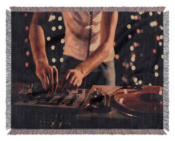 Mixing on the DJ desk Woven Blanket