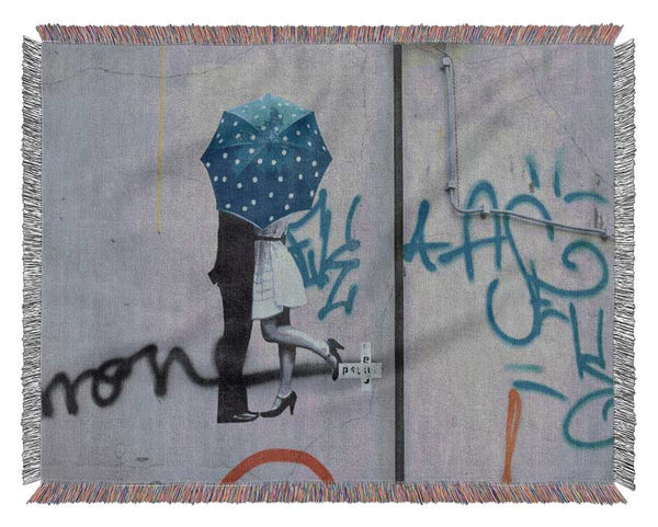 Kissing under the umbrella graffiti Woven Blanket