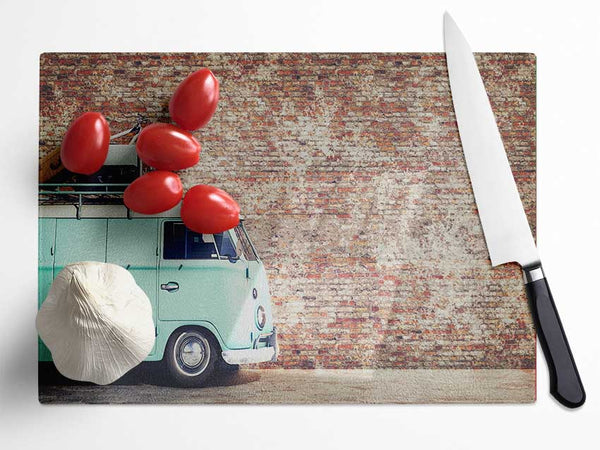 The Camper In Front Of Bricks Glass Chopping Board