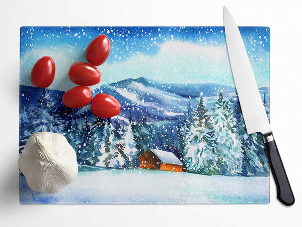 Snowy Cabin In The Mountains Glass Chopping Board