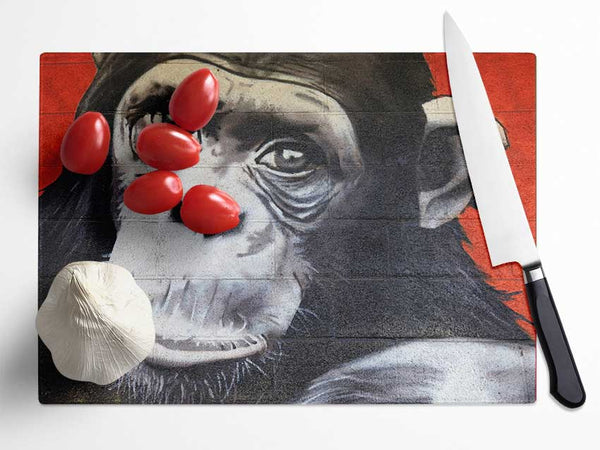 The Chimp On Red Glass Chopping Board