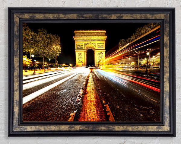 Arc De Triomphe At Night Framed Print