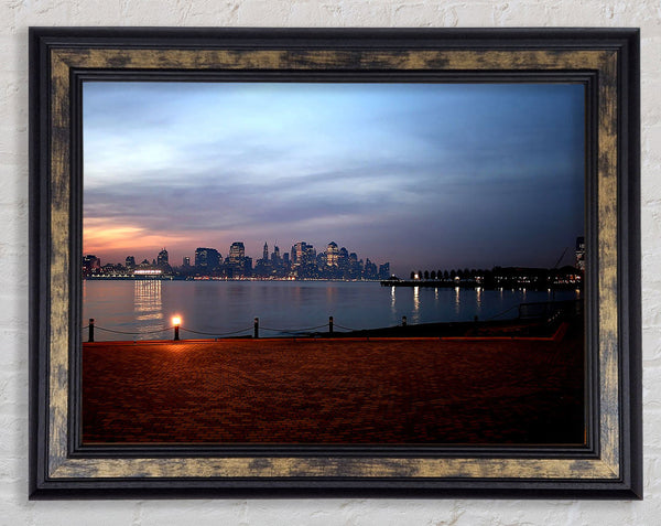City Across The Water Framed Print