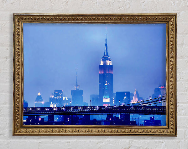 Empire State Building Blue Night Framed Print