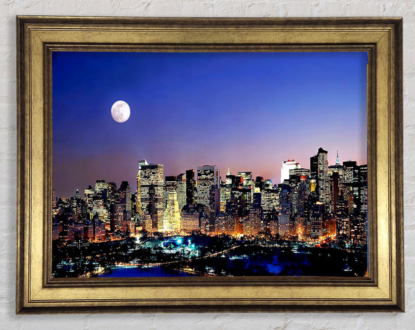 Moon Over Manhattan Framed Print