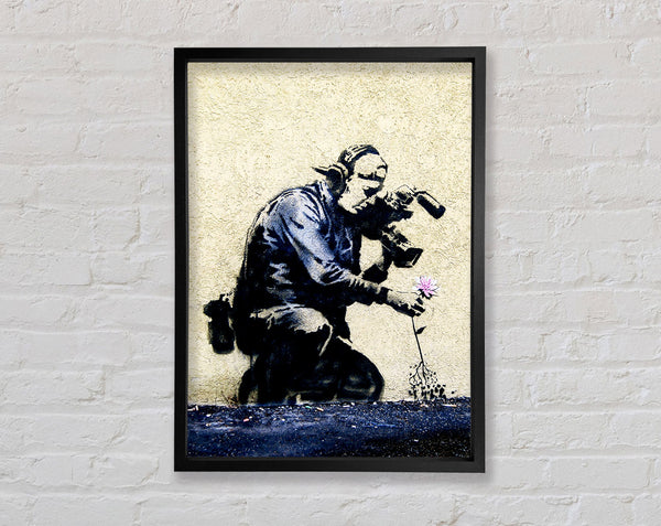 Banksy Pulling The Roots Of Life Framed Print