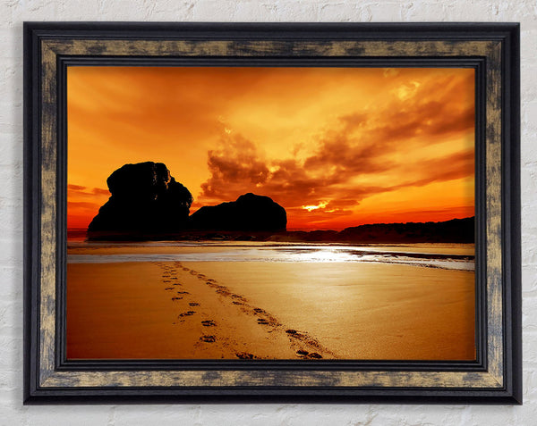 Footprints In The Orange Ocean Sand Framed Print