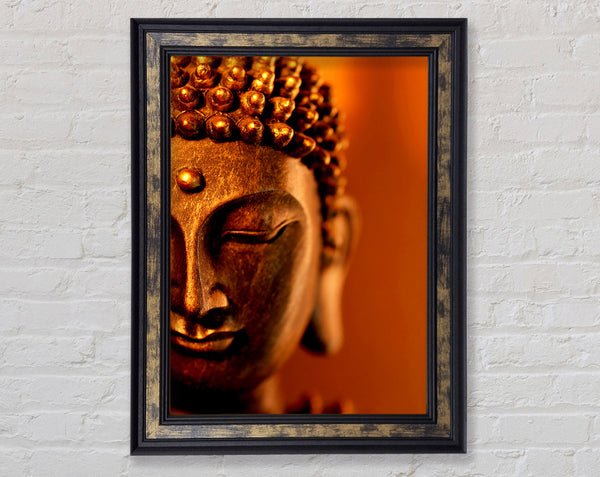 Buddha Face Orange Framed Print
