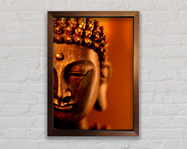 Buddha Face Orange Framed Print