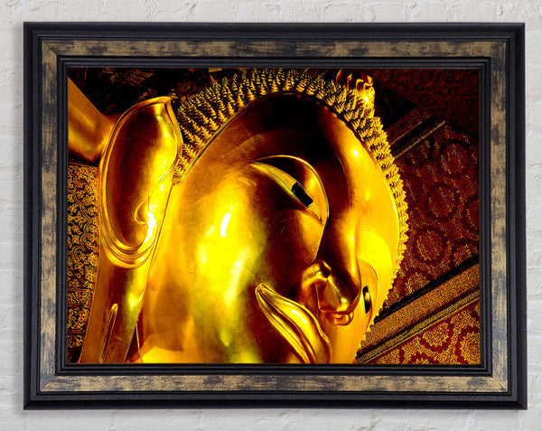 Golden Buddha Face Framed Print