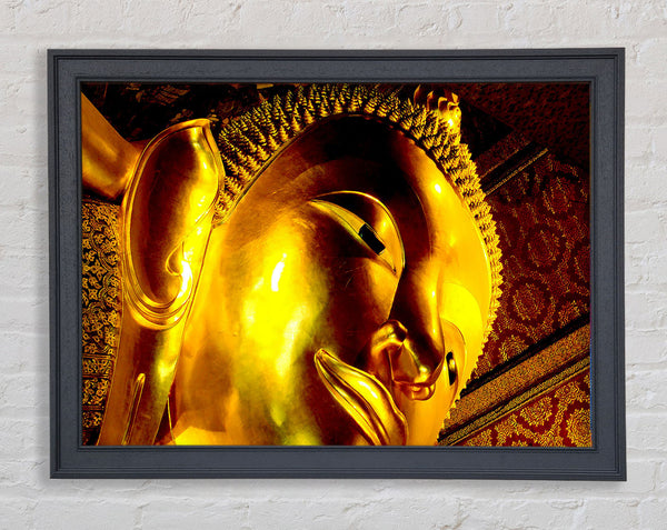 Golden Buddha Face Framed Print