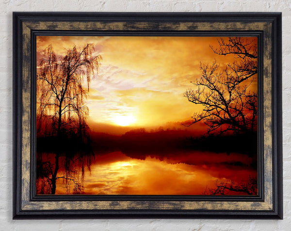 Golden Clouds Over The Lake Framed Print
