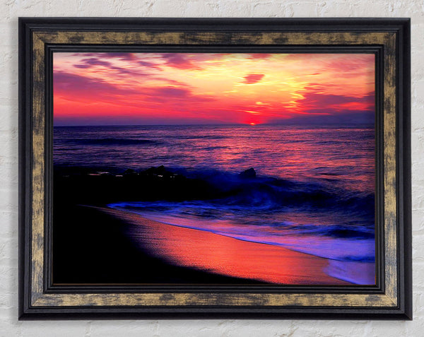 Stunning Red Distant Sun Ocean Framed Print