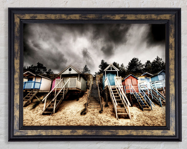 Beach Hut Storms Framed Print