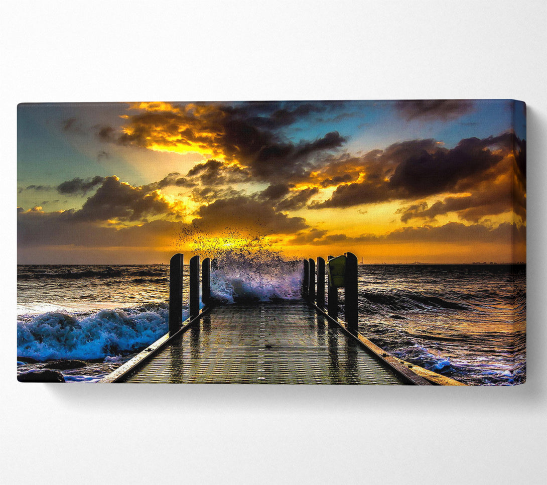  A Canvas Print of Waves Crashing On The Pier At Sunset Canvas Art