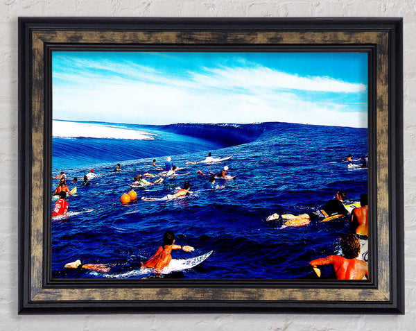 Surfers Hunt For The Ultimate Wave Framed Print