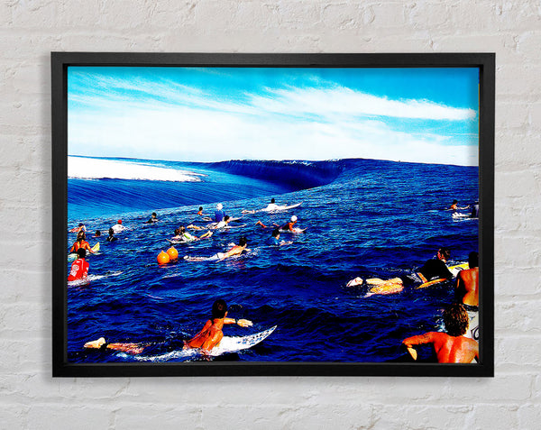 Surfers Hunt For The Ultimate Wave Framed Print