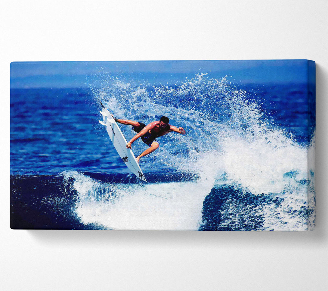  A Canvas Print of Surfer Jumping The Wave Canvas Art