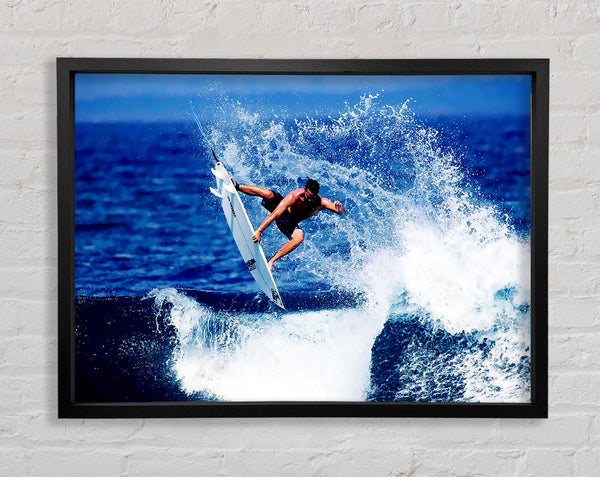 Surfer Jumping The Wave Framed Print