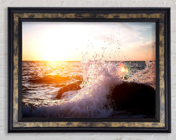Crashing Waves In The Sunset Framed Print