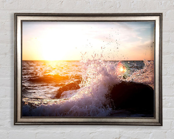 Crashing Waves In The Sunset Framed Print