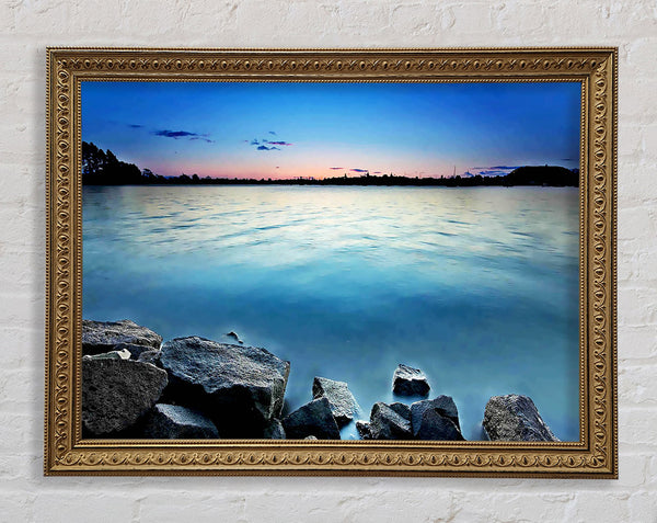 Ice Blue Ocean Rocks Framed Print