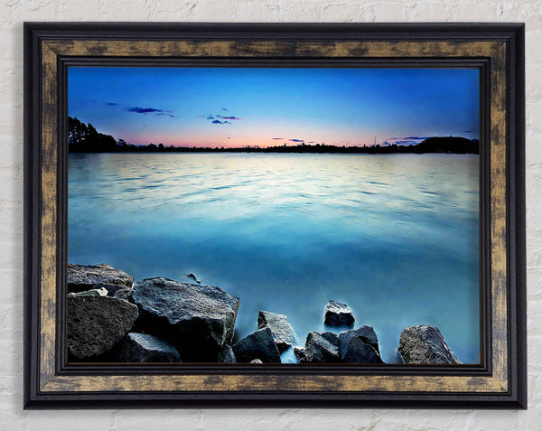 Ice Blue Ocean Rocks Framed Print