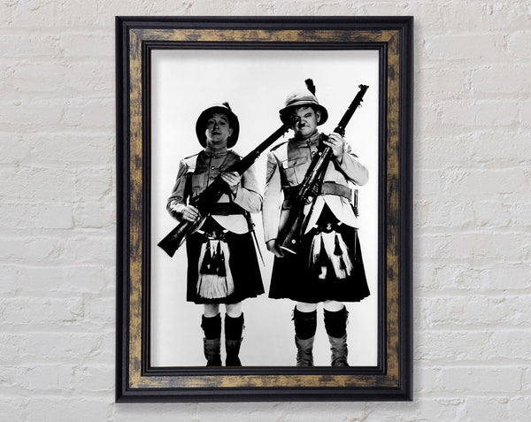 Laurel And Hardy Highland Scot Framed Print