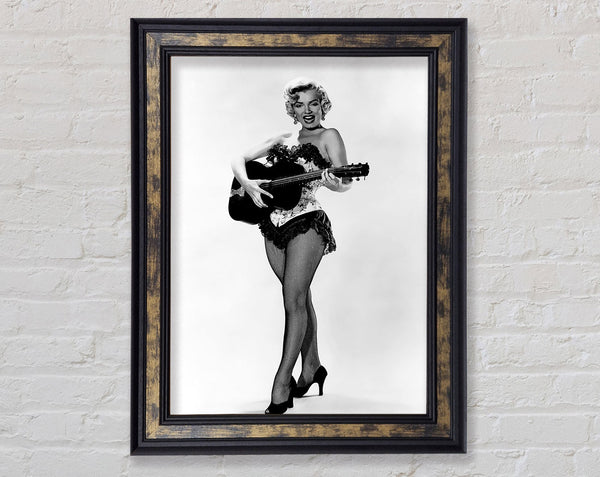 Marilyn Monroe Playing Guitar Framed Print