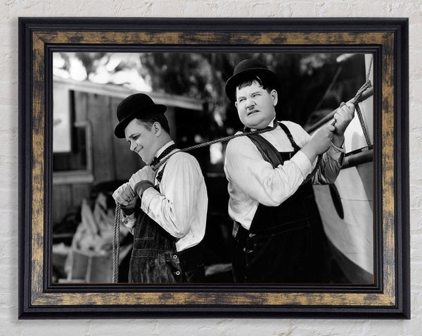 Laurel And Hardy Heave Framed Print