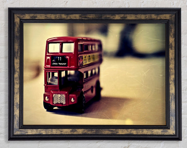 Old English Bus Toy Framed Print