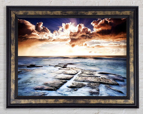 Ocean Shore Below The Clouds Framed Print