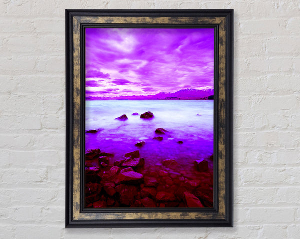 Purple Skies Over The Turquoise Ocean Framed Print