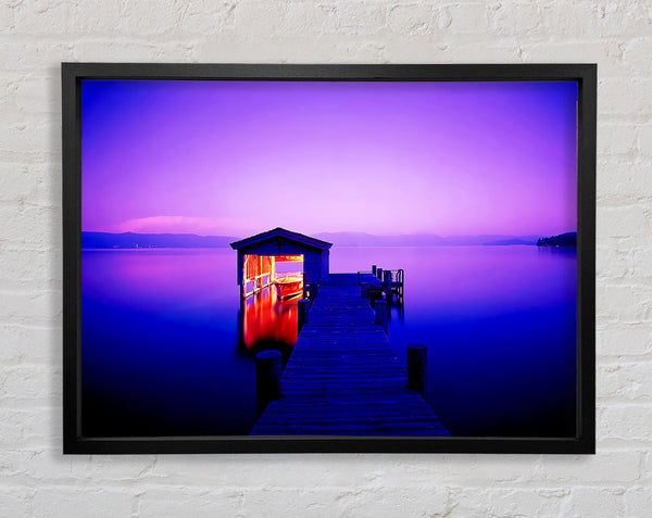 Tranquil Lake Boat House Purple Framed Print