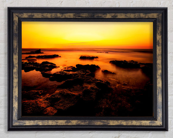 Yellow Sunset Rocks Framed Print