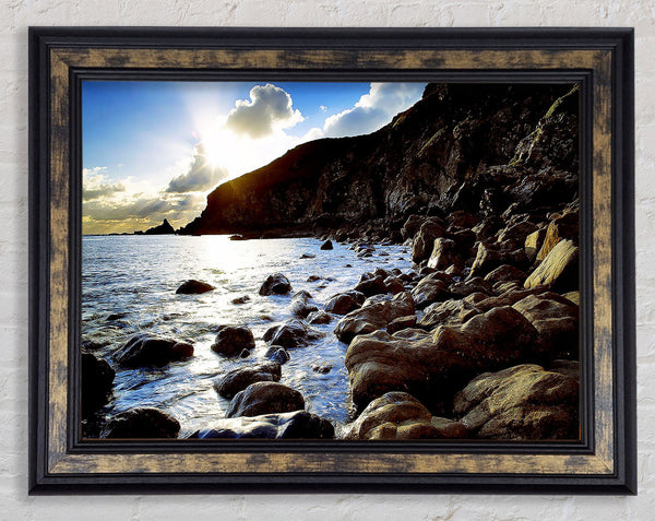 Sun Kissed Ocean Rocks Framed Print
