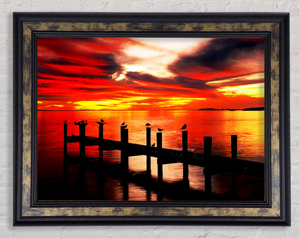 Pier Fire Sky Framed Print