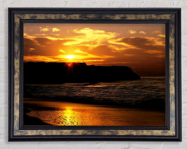 Sunrise Over Ocean Rocks Framed Print