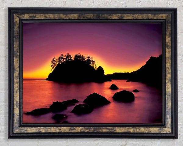 Pink Sunset Behind The Mountain Framed Print