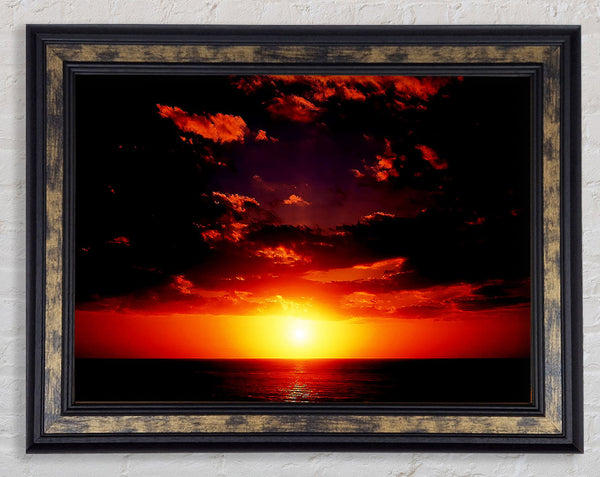 Sunset Through The Black Ocean Clouds Framed Print