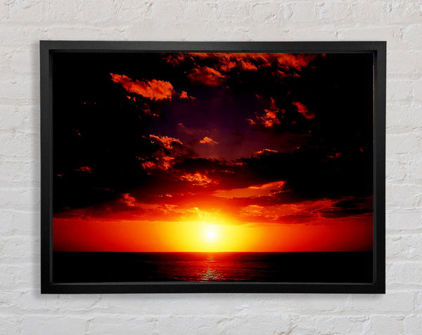 Sunset Through The Black Ocean Clouds Framed Print